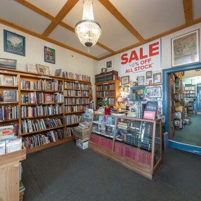 Melbourne auctions: Carlton North bookstore with a unit on top sells at least $390,000 more than reserve