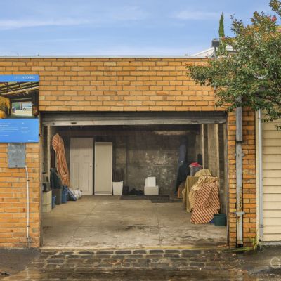 ‘A bit stunned’: Albert Park garage sells for $645,500 at auction, $245,500 above reserve