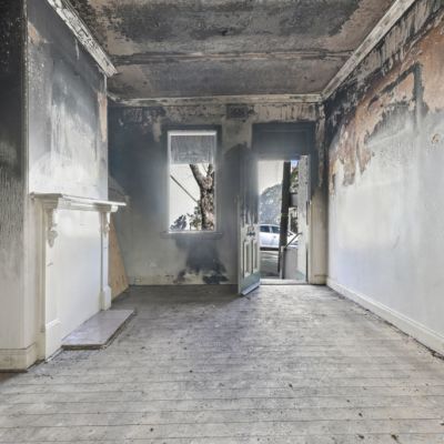 ‘Scorched but salvageable’: Fire-ravaged Glebe terrace hits the market