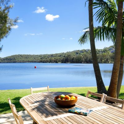 Northern beaches lakefront house fetches $4.9m at auction, $900,000 over reserve