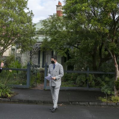 Melbourne auctions: Unrenovated Brunswick home sells for $2.325m as on-site auctions return