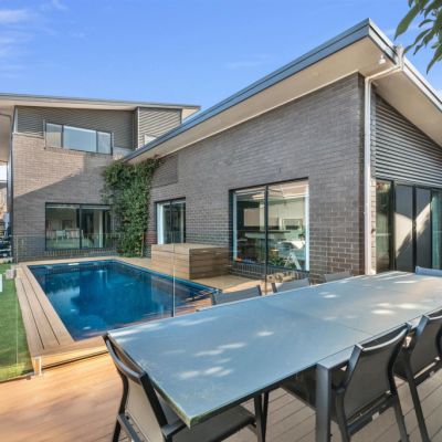 Seven homes on the market with pools to help you make the most of summer