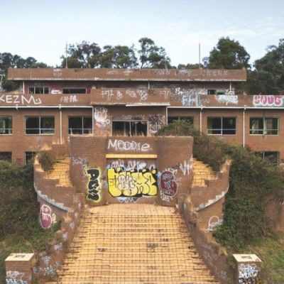 Empty graffiti mansion for sale in Victorian Yarra Valley town of Cockatoo