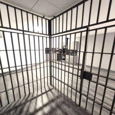 Studio apartment for rent in the UK has a jail cell in the living room