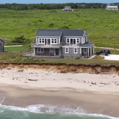 Watch as the ocean creeps in to swallow this waterfront mansion