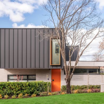 What’s behind the bright orange door of this luxurious Red Hill home?