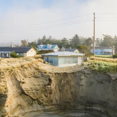 Living on the edge: House perched on crumbling cliff for sale