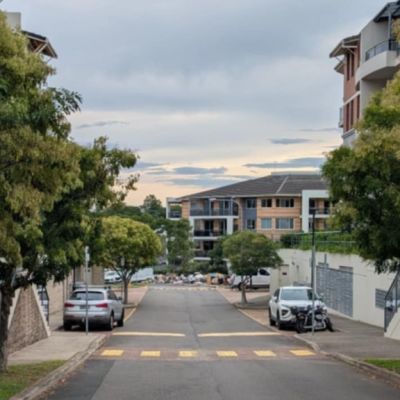 Residents battle council over massive junk pile in upmarket Sydney suburb