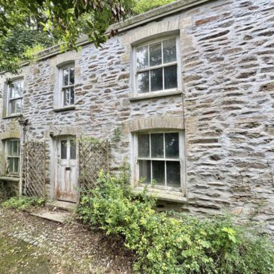 Woodland cottage has previous owner buried in the garden