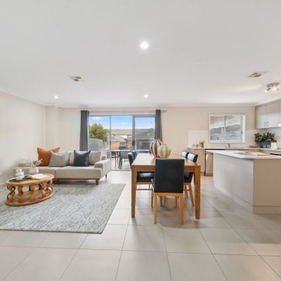 Canberra auctions: Interest rate drop sparks solid sales