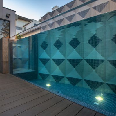 This sleek glass tank is one of Australia’s best backyard pools