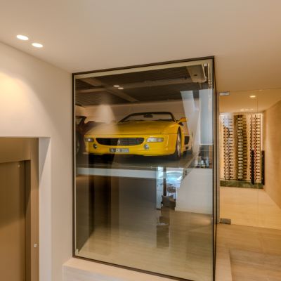 Forget porcelain and pottery: This home's display cabinet holds four cars