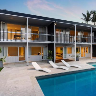 Shoe supremo lists poolside mansion for secret sum