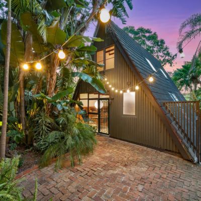 Inside a creative couple’s treetop home for sale just 45 minutes from Sydney