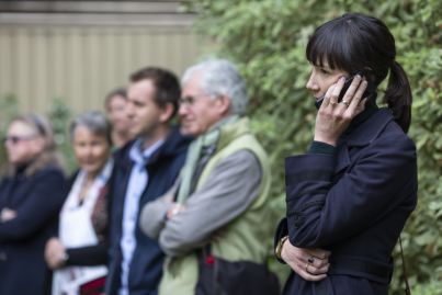Investors beat out home buyers at hard-fought auction in Fitzroy