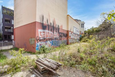 Developers pounce on vacant site that wraps around ventilation stack