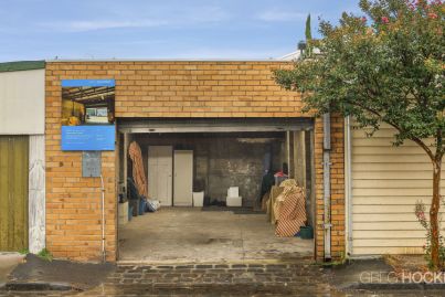 ‘A bit stunned’: Albert Park garage sells for $645,500 at auction
