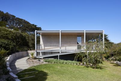 Inside the former beach shack clad in a surprising luxury stone