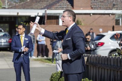 Glen Waverley house sells for $120,000 more than reserve in front of a crowd at auction