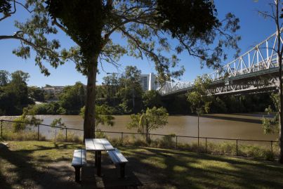 Why locals won't leave this riverside Brisbane suburb