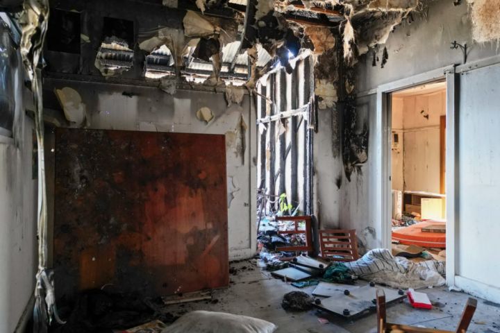 A fire-ravaged home sells for $98,000 in ‘competitive’ bidding war.
