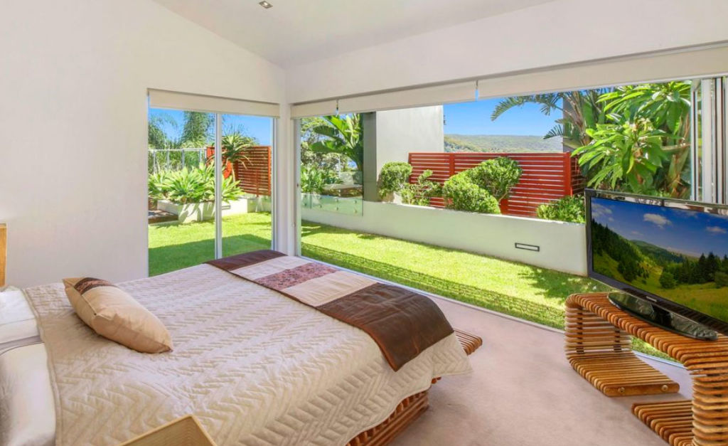 The home boasts five bedrooms, including a large master suite with a walk in wardrobe and ensuite bathroom.  Photo: LJ Hooker Terrigal Photo: undefined