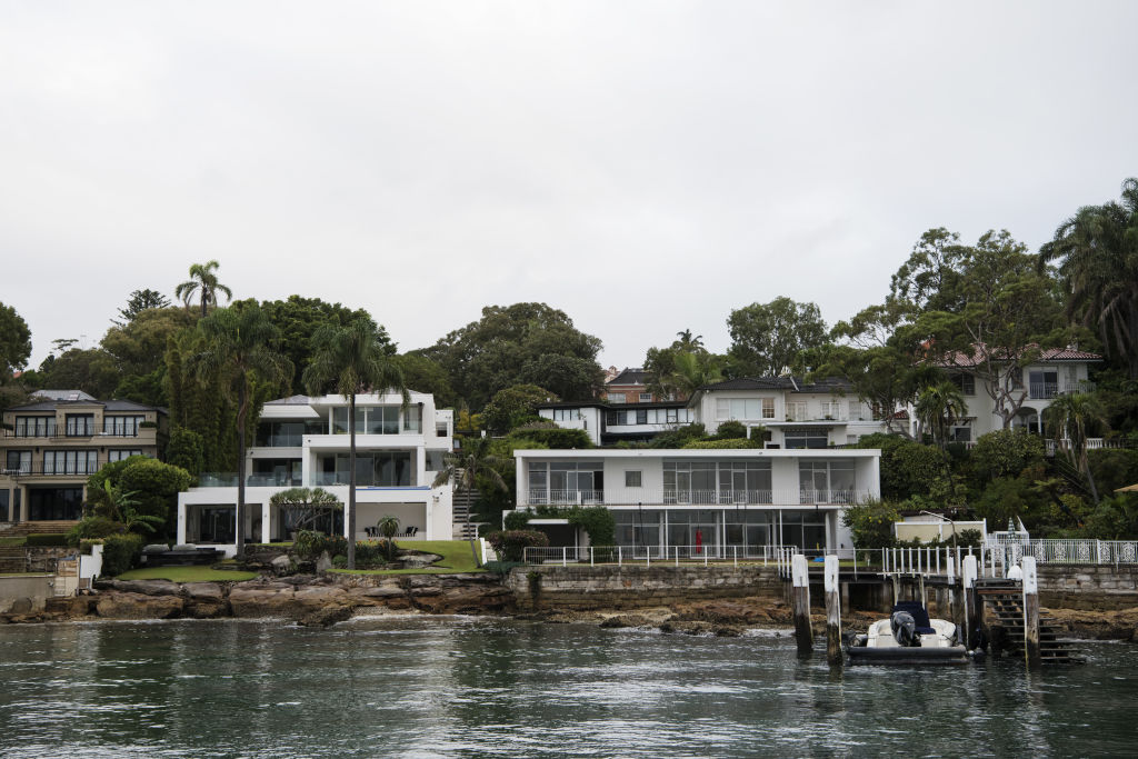 The two waterfront houses and two streetfront houses behind bought by Leon Kamenev for $80 million. Photo: James Brickwood