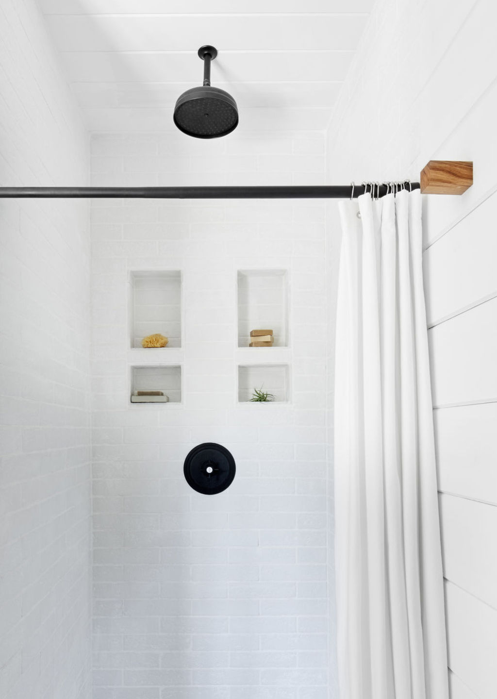 Shower curtains are one of the most neglected parts of the home when it comes to cleaning. Photo: Stocksy Photo: undefined