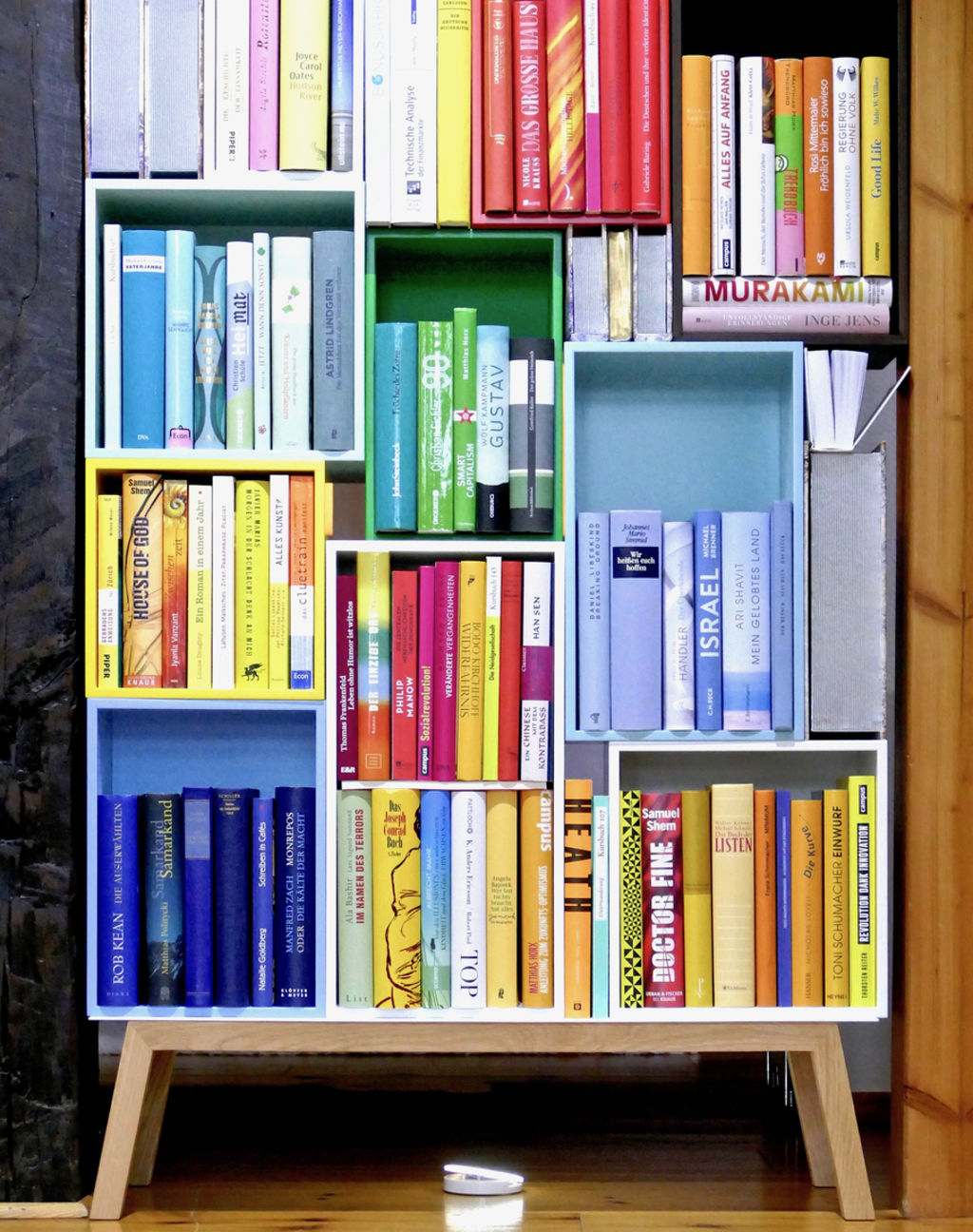 Whether it's a few or a lot, books add so much personality and if you curate the right ones – colour! Photo: iStock