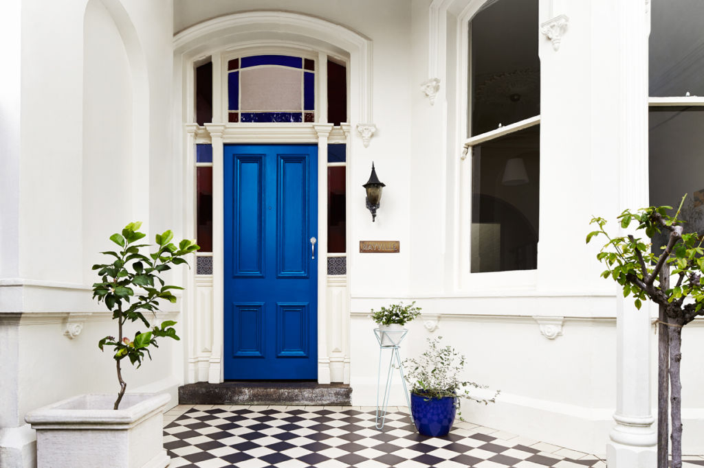 Don't have time to paint your whole exterior? Think about adding a pop of colour to your front door for a statement. Photo: Dulux Photo: Dulux