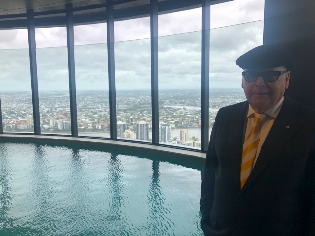 Architect Noel Robinson by the pool on the 80th floor of the Brisbane Skytower. Photo: Ellen Lutton