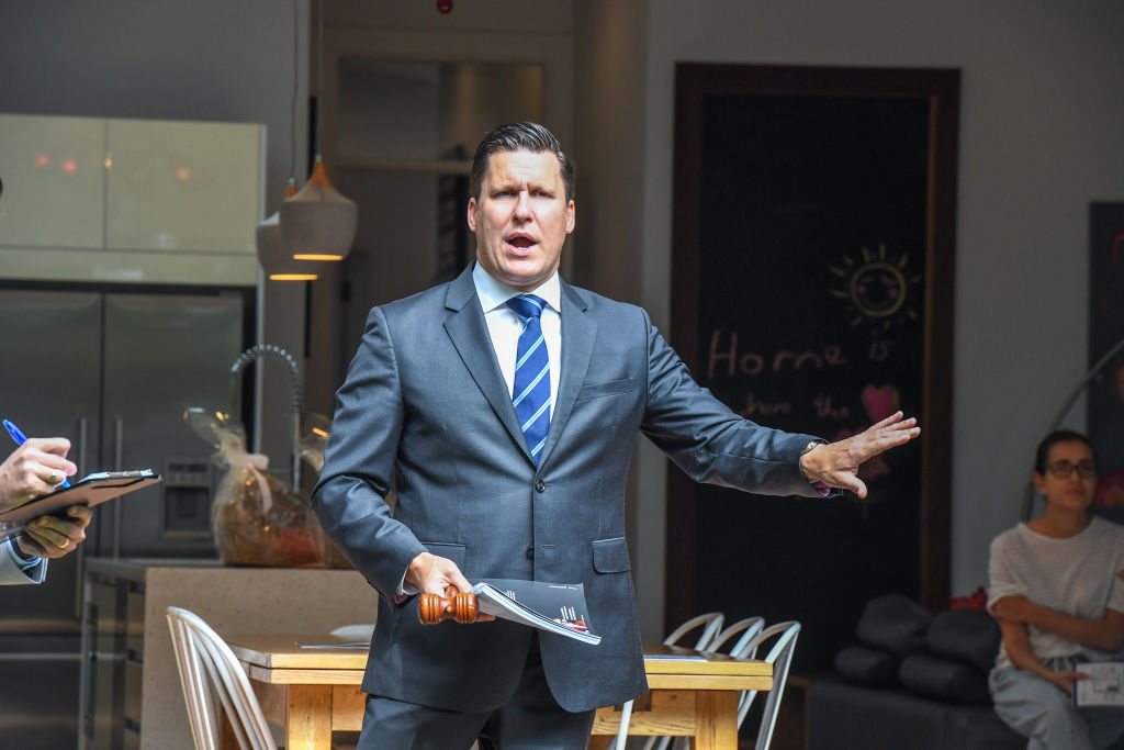 Auctioneer Peter Matthews in action at the auction of 5 Fourth Avenue, Willoughby  Photo: Peter Rae