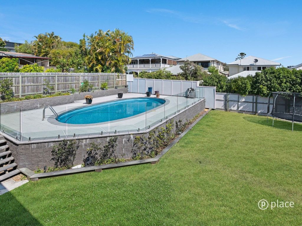 The sprawling backyard and pool at 13 Newman Avenue, Camp Hill. Photo: Place Bulimba. Photo: undefined
