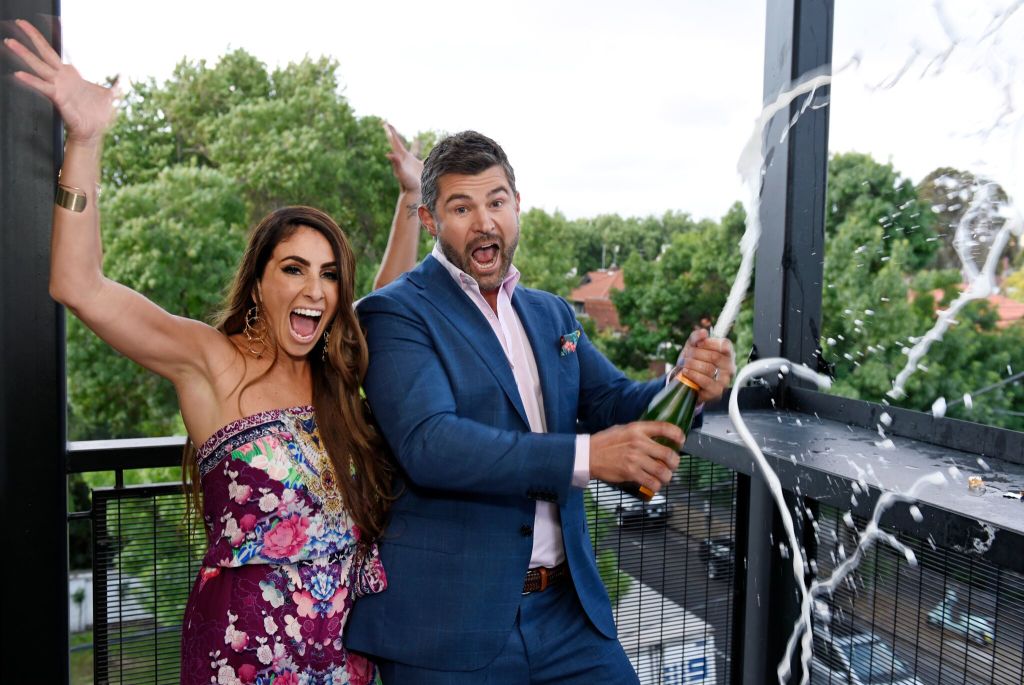 Former contestants Hayden and Sara celebrating their win in 2018. Photo: Martin Philbey
