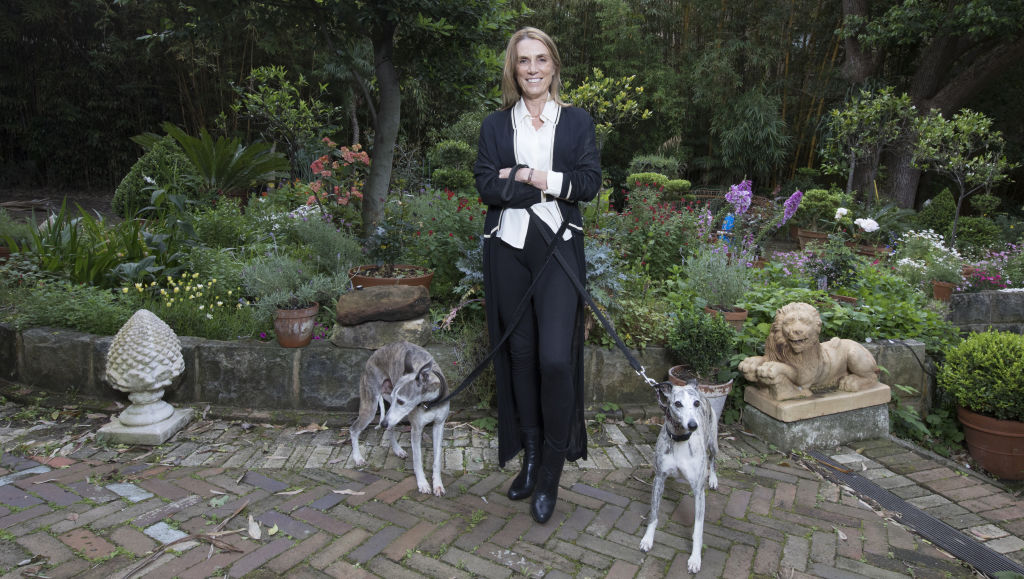 France is pictured in the garden of Iona, Darlinghurst, which she sold on behalf of Baz Luhrmann and Catherine Martin. Photo: Jessica Hromas