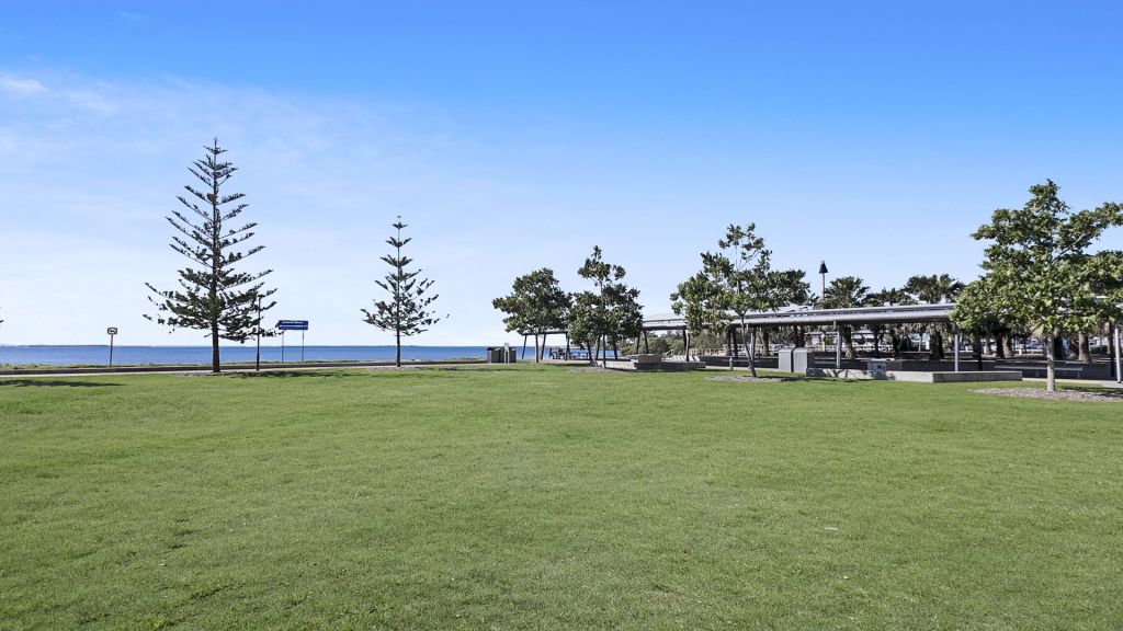 Parkland on the waterfront at Manly, Brisbane, across from Lambert Macchion's Esplanade house. Photo: Ray White Wynnum/Manly Photo: undefined
