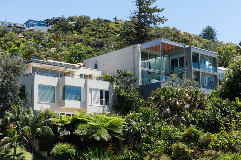 Whale Beach's hills are dotted with prestige residences, though a few original cottages remain. Photo: Steven Woodburn Photo: Steven Woodburn