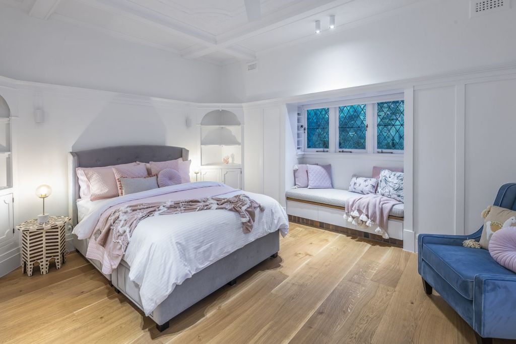 What was originally a lounge with built-in joinery is now a gorgeous bedroom at 47 Hazelmere Parade, Sherwood. Photo: Adcock Prestige.