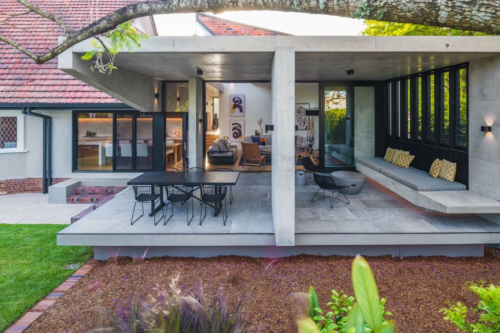 The glass, concrete and brick extension at 47 Hazelmere Parade, Sherwood, which artfully pays homage to the original house. Photo: Adcock Prestige.