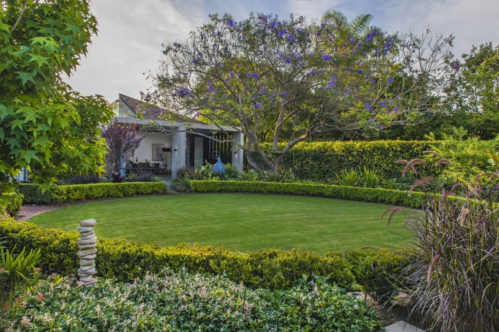 Decades worth of beautiful gardens were preserved during the renovation at 47 Hazelmere Parade, Sherwood. Photo: Adcock Prestige.
