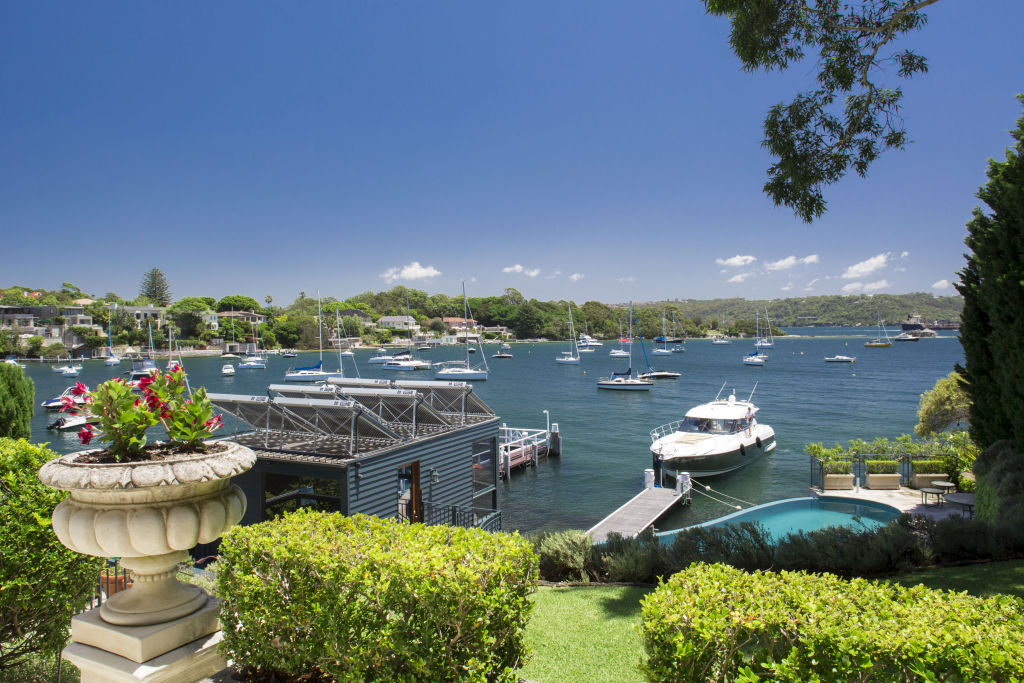The five-bedroom house has a gym, sauna, indoor spa, pool, boathouse and deepwater jetty. Photo: Supplied