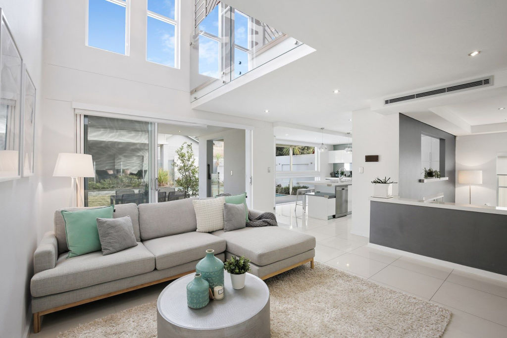 Soaring ceilings amplify your sense of space inside. Photo: Supplied