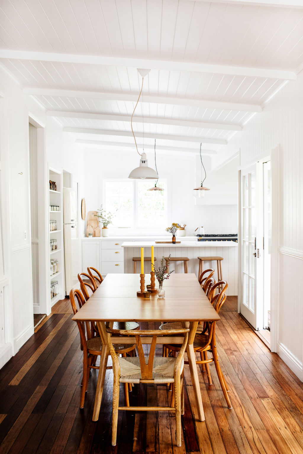 The dining room. Courtney and Michael bought the Wishbone chairs off the previous homeowner. Photo: Kara Rosenlund