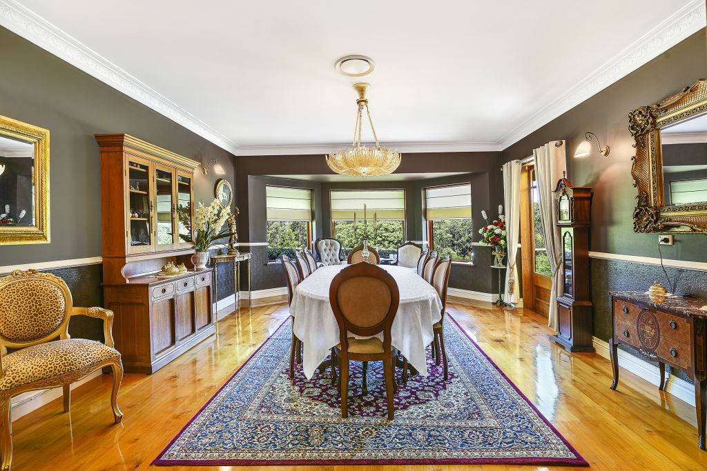 The formal dining room recalls an old-world glamour. Photo: Supplied