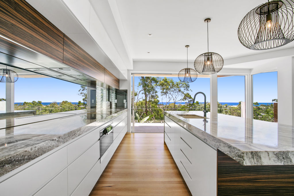 You can look out across Noosa River and Noosa National Park from the kitchen. Photo: Supplied