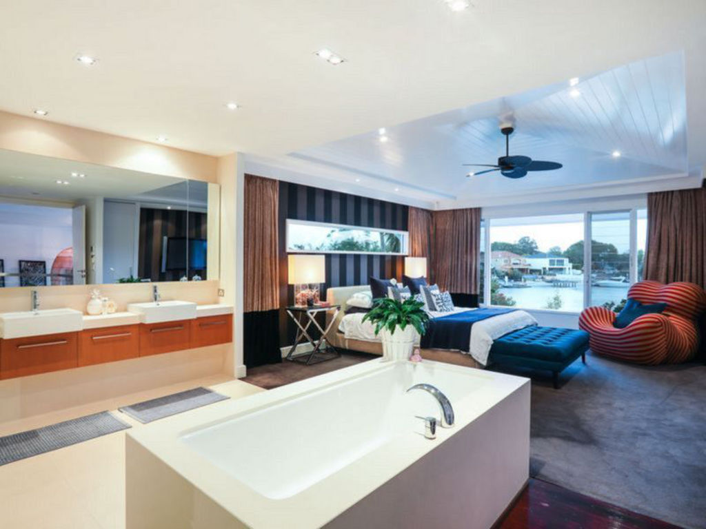 The luxurious main bedroom arguably has the best seat in the house. Photo: Supplied