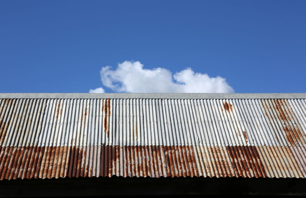 Recent trends towards rustic and recycled materials have increased demand for rusted metal roofing. Photo: iStock