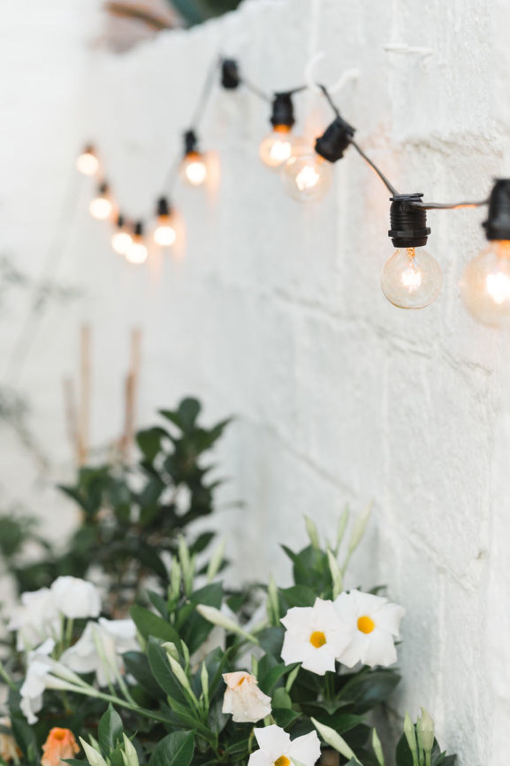 Lighting is often an afterthought when designing an outdoor living area, but it’s integral to how the space feels. Photo: Stocksy