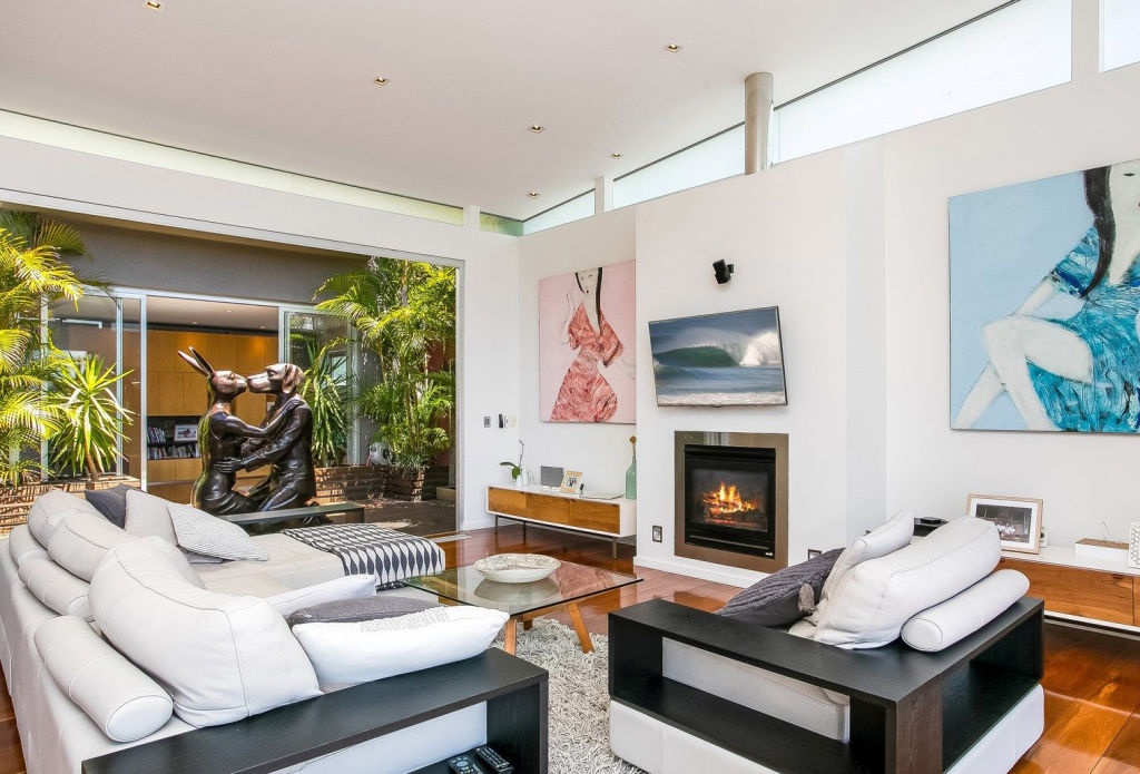 The resort-style property has open-plan living areas and an internal courtyard. Photo: Supplied