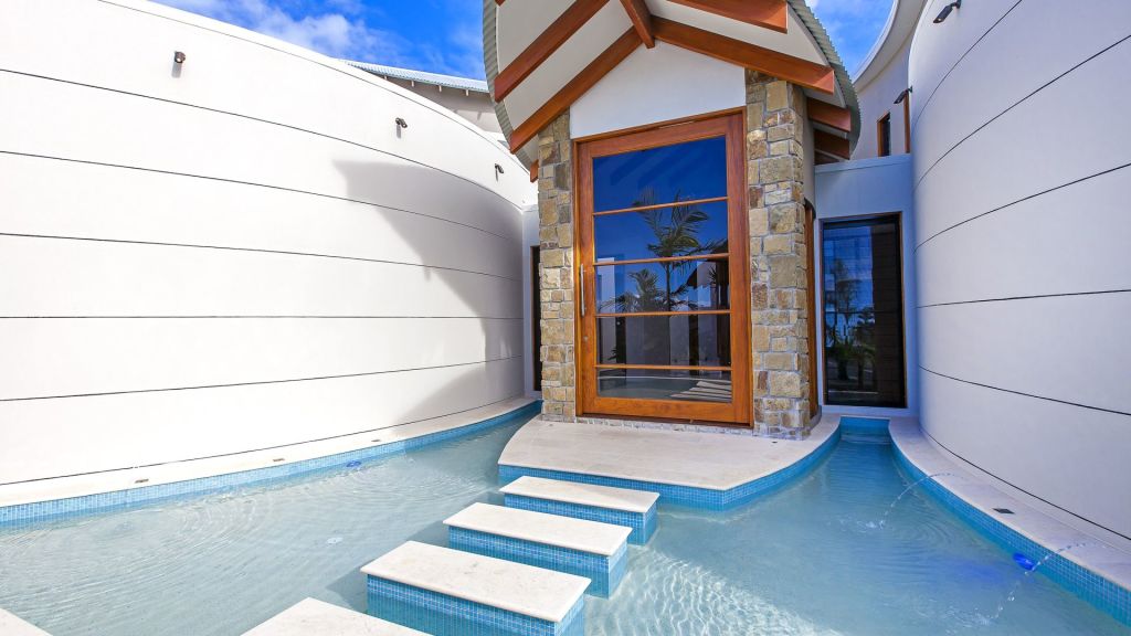 That's a cool entrance: 6 Rainbow Lane, Pelican Waters. Photo: Cloud Nine Real Estate